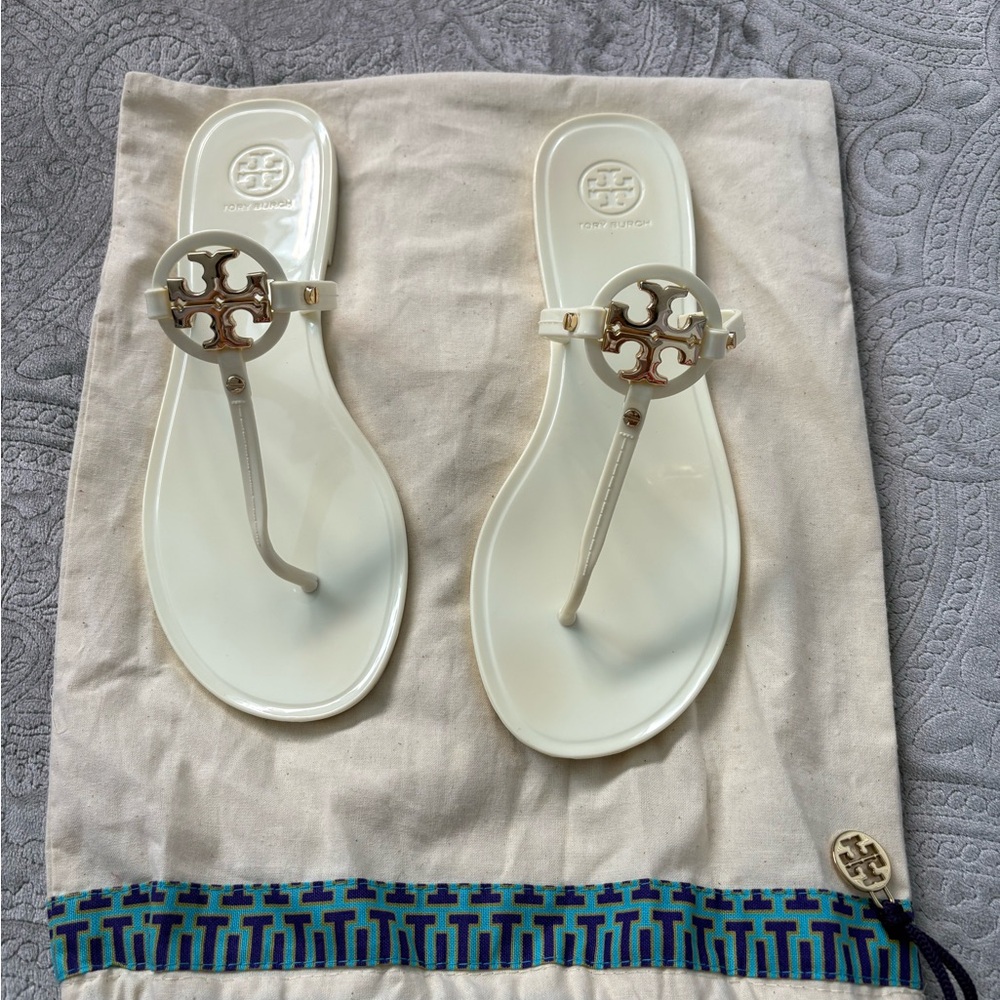 Tory Burch Cream Jelly Thong Sandals with Gold Medallion